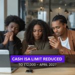 Black British professionals reviewing savings information together on laptops and mobile banking apps in a UK office.