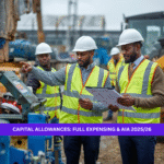 Black British construction managers wearing safety helmets and high-visibility vests reviewing machinery and documents on a UK construction site, representing capital allowances, full expensing, and AIA for 2025/26.
